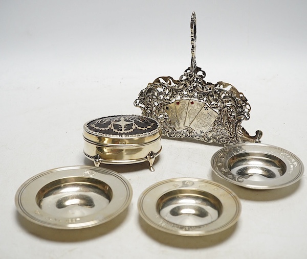 A Dutch silver playing card holder, three small silver ‘Armada’ dishes and a silver and tortoiseshell trinket box (5). Condition - fair, latter a.f.